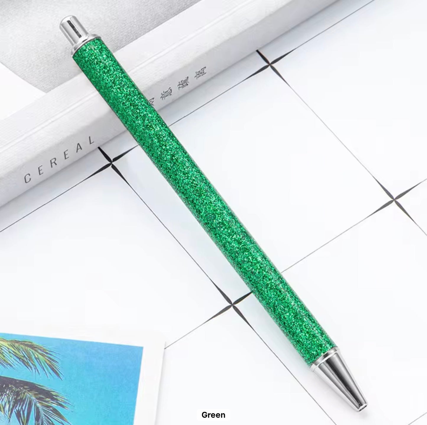 Glitter metal retractable ballpoint pen.
